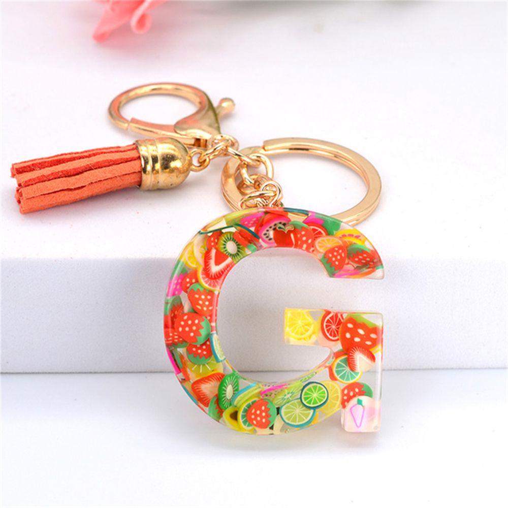 Móc Khóa Hình 26 Chữ Cái Gắn Lát Trái Cây Màu Sáng Phối Tua Rua Thời Trang Cho Nữ