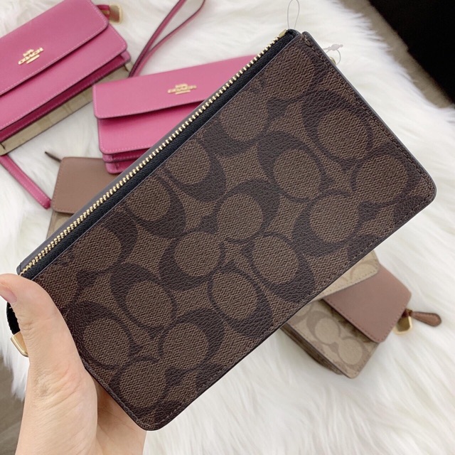 VÍ COACH FOLDOVER WRISTLET IN SIGNATURE CANVAS
