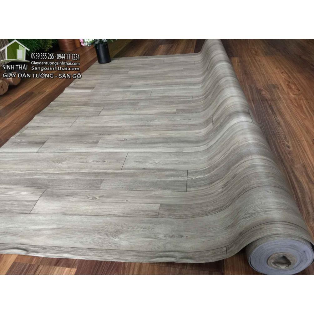 Simili trải sàn vân gỗ màu xám, mẫu mới ra, bề mặt có vân nhám như gỗ thật.