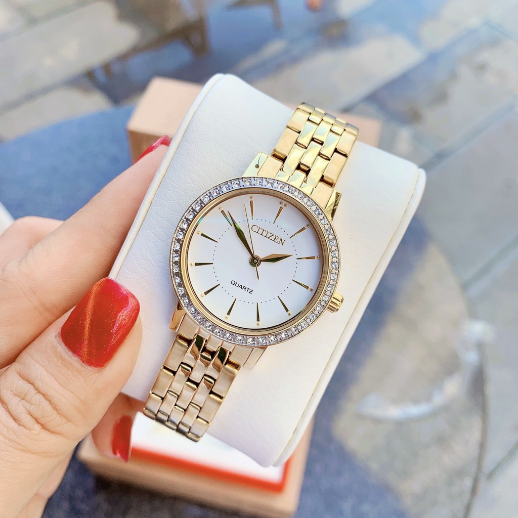 Đồng hồ Nữ Citizen EL3042-84A Mặt trắng,Viền pha lê-Máy Pin Quartz-Dây kim loại mạ vàng cao cấp-Size 31mm