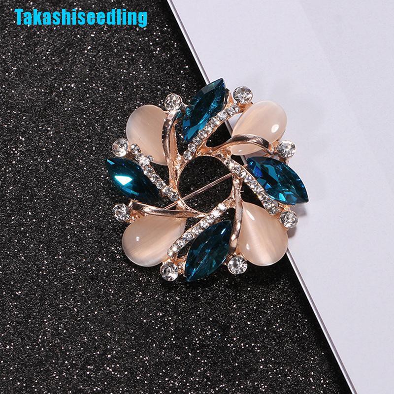 Ghim cài áo hình hoa đính đá lấp lánh