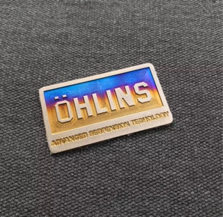 Tem titan chữ Ohlins dán chân phuộc