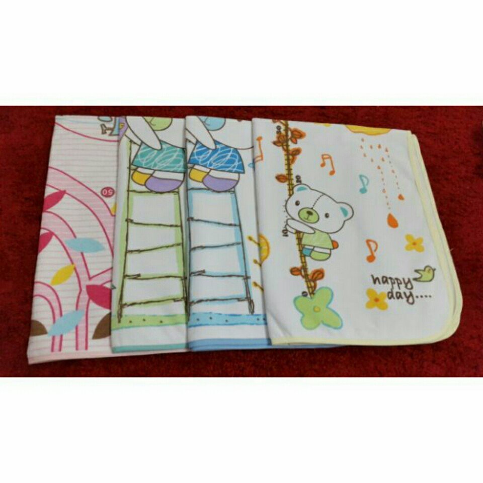 Tấm lót thay bỉm có thước đo chiều cao cho các Bé