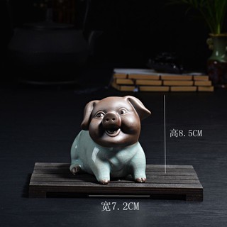 Tượng heo vui vẻ may mắn