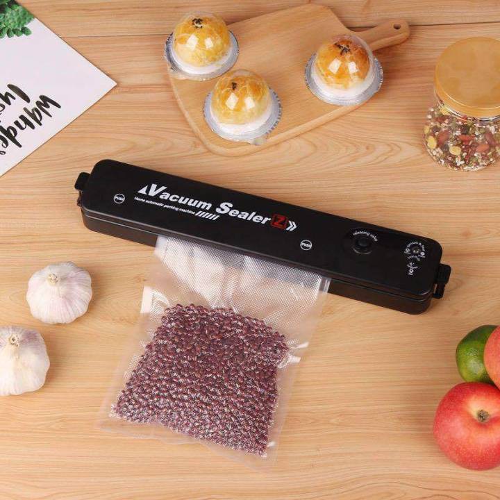 Máy Hút Chân Không Thực Phẩm Cho Gia Đình Vacuum Sealer - Nhỏ gọn Tiện Lợi - Tặng Kèm 10 Túi Nilon Hút Chân Không - BH6T