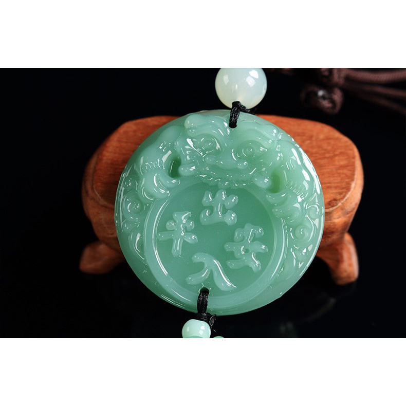 Khánh treo xe hơi xanh ngọc tua rua