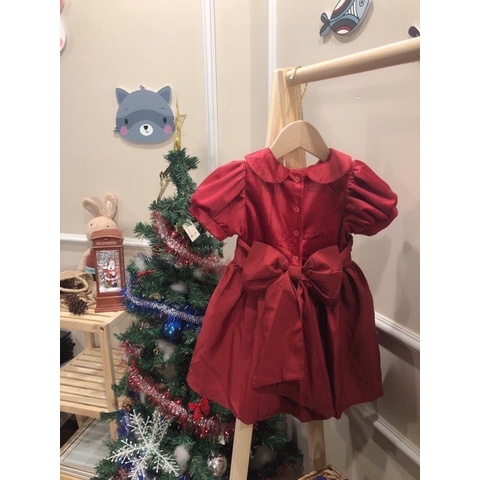 Váy Next đỏ tay bồng cổ sen đính nơ sau