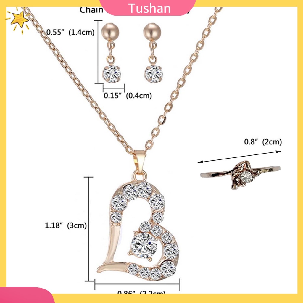 Bộ nữ trang gồm vòng cổ mặt trái tim bông tai và nhẫn đính đá pha lê sang trọng