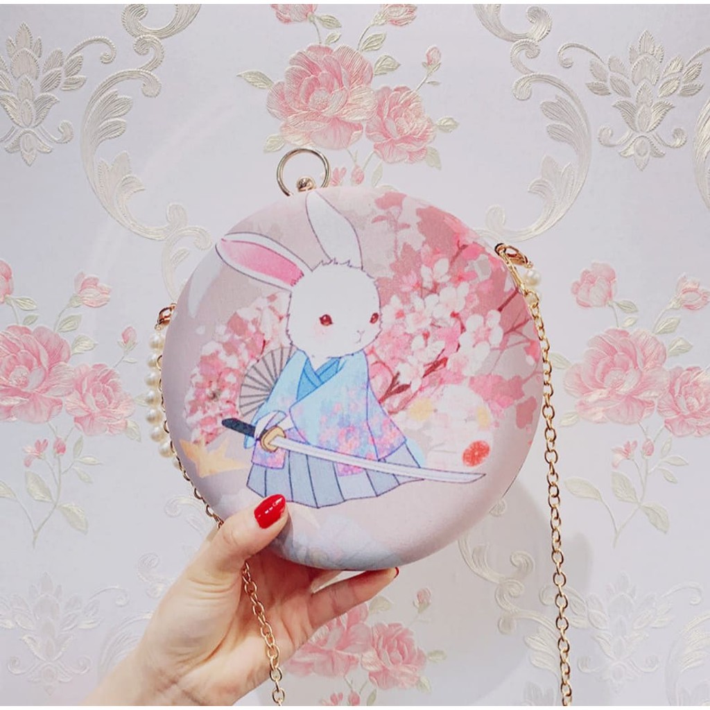 Túi tròn cổ trang họa tiết in