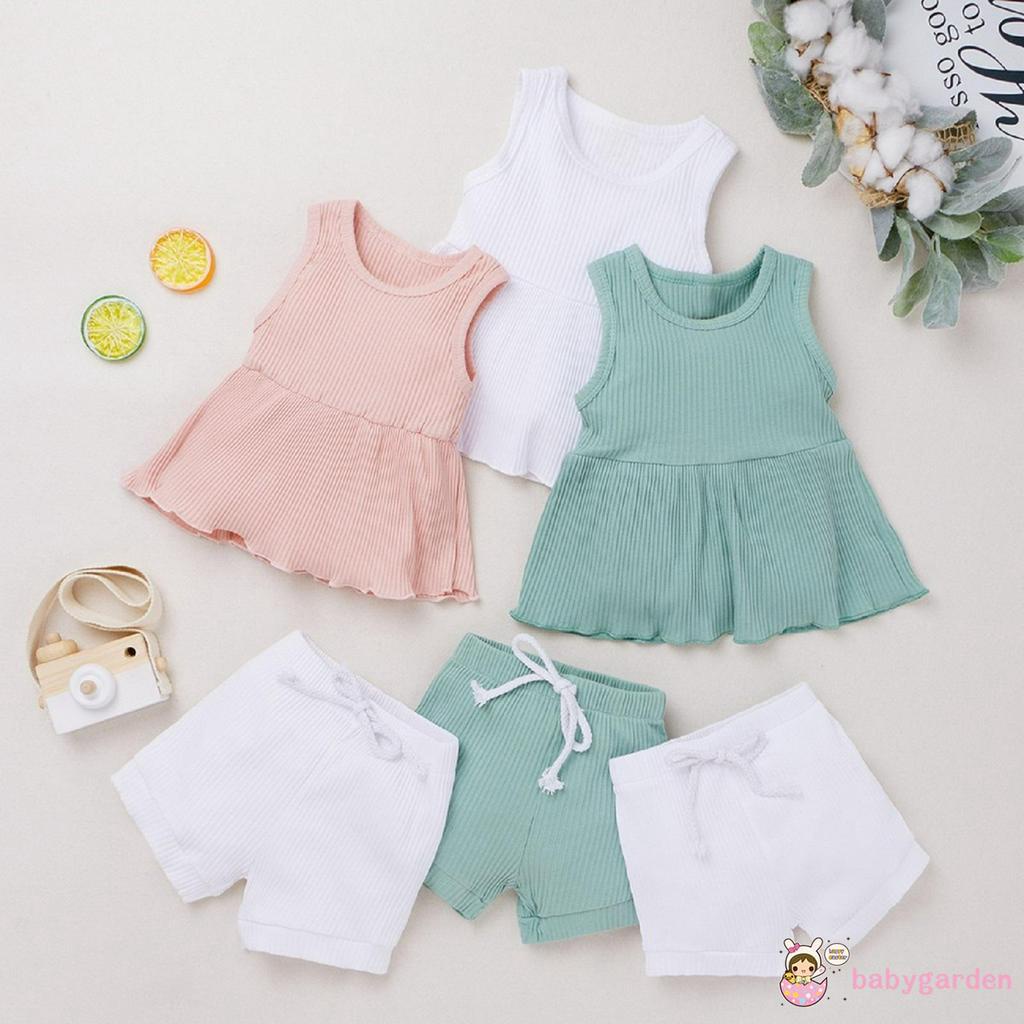 Bộ áo không tay cổ tròn và quần short bằng vải thun gân cho bé gái từ 2-7t