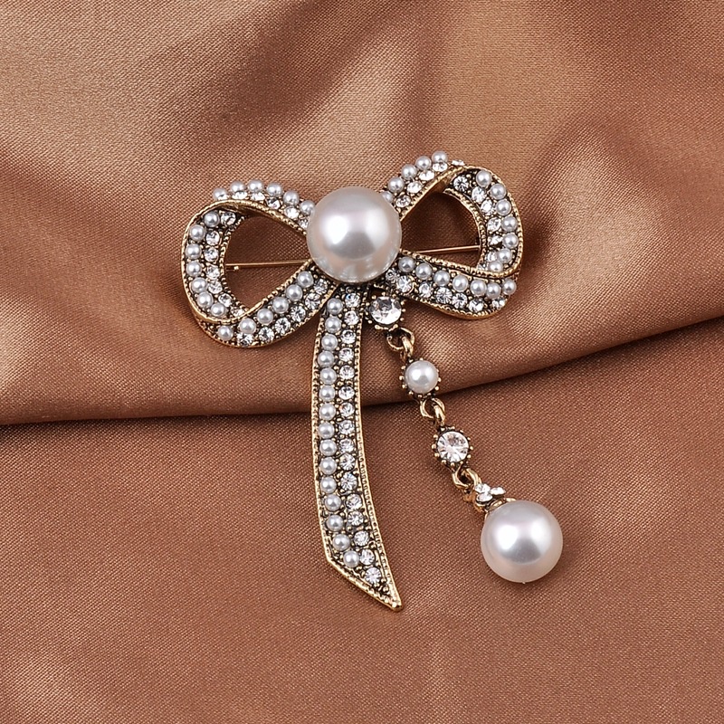 Ghim Cài Áo Hình Nơ Đính Đá Và Ngọc Trai Sang Trọng