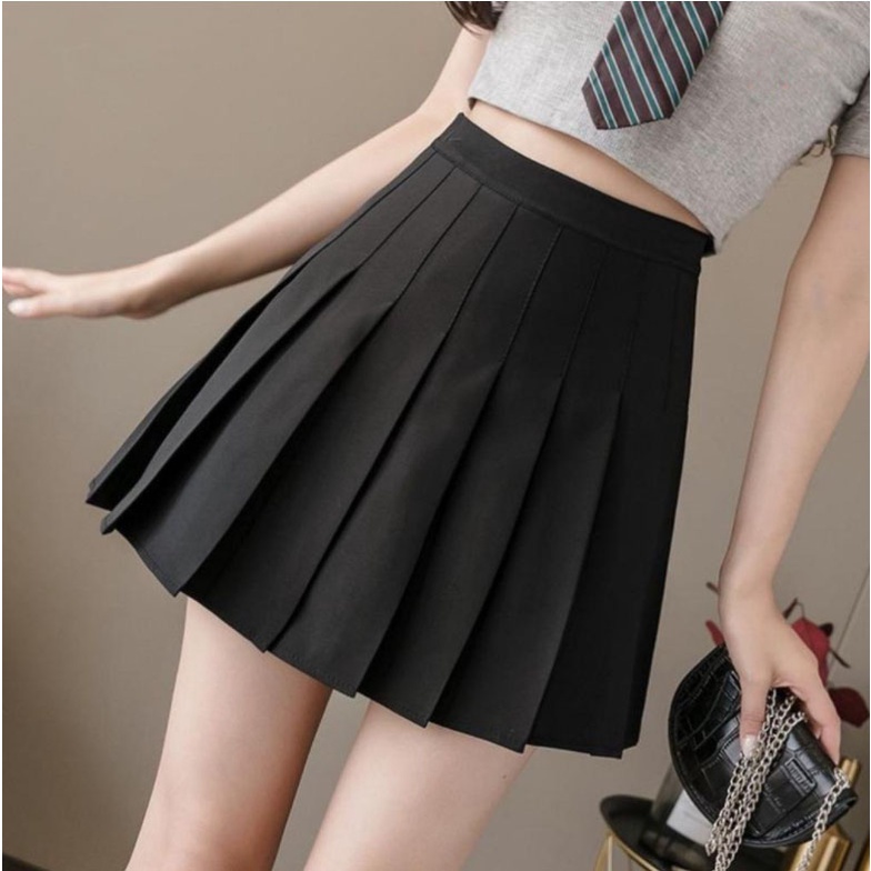 Chân váy ngắn dáng tennis xếp ly, kiểu dáng Hàn Quốc xinh xắn và trẻ trung.