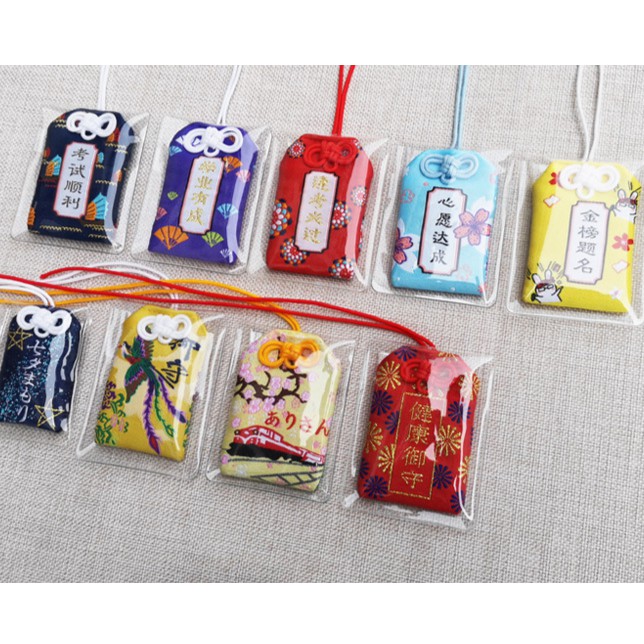 Túi Phước May Mắn Omamori Bọc Vỏ Silicon tặng Đá Ngũ Sắc