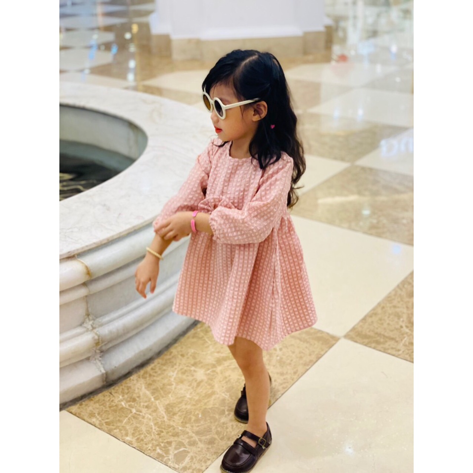 váy kẻ dài tay bé gái có nơ, lên form xinh, dễ mặc. Size 1-8T, cho bạn 9-25kg