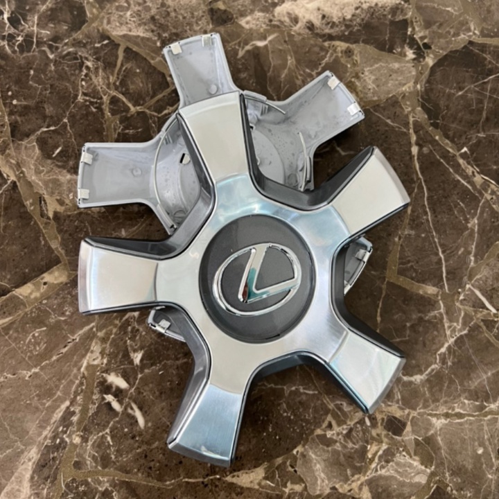 01 Logo chụp mâm, ốp lazang bánh xe ô tô Lexus LX-570 TY-K199  Đường kính chân cài: 10cm, Cao: 3.5cm