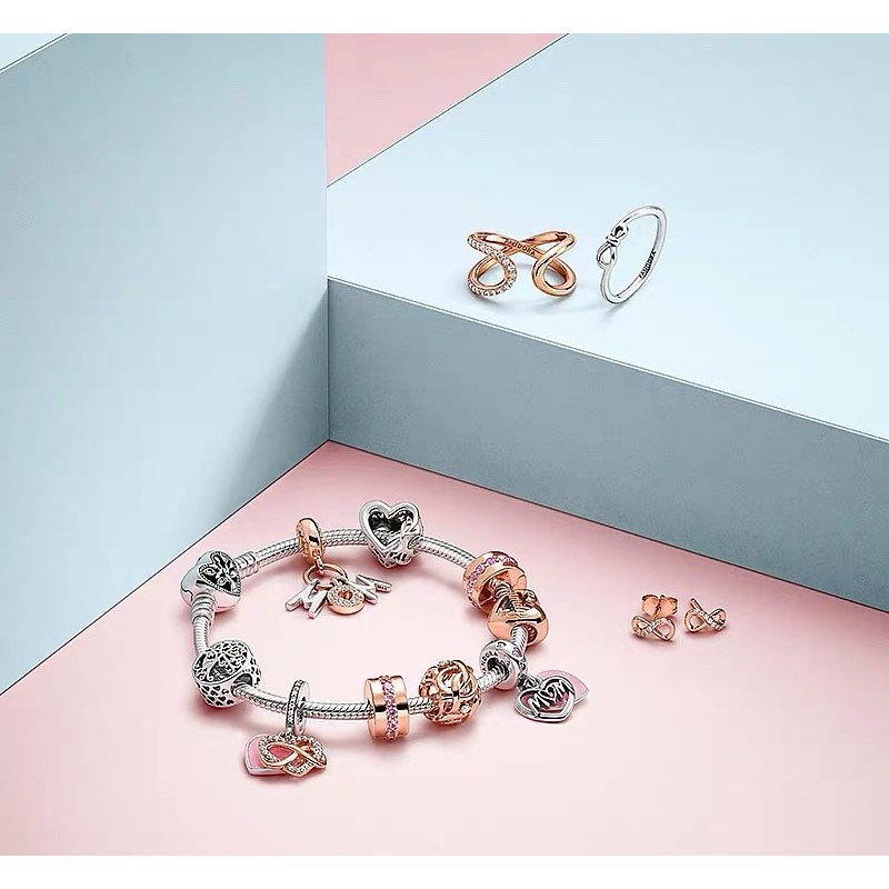 charm pan xỏ ngang đan sợi vàng hồng bạc s925