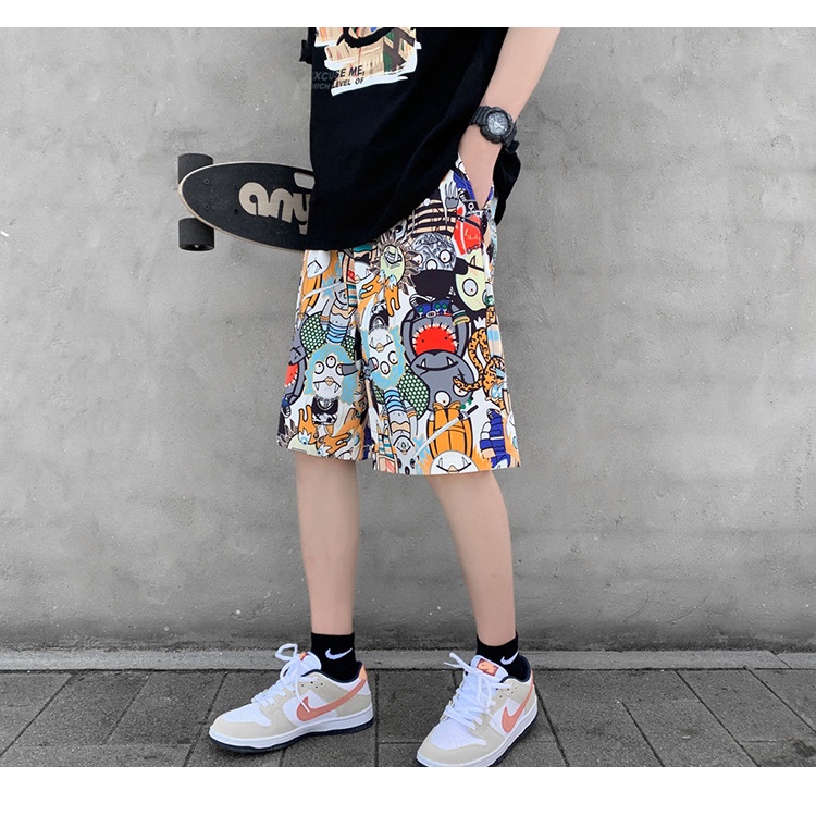 Quần ngắn họa tiết hoạt hình thời trang đi biển dành cho nam