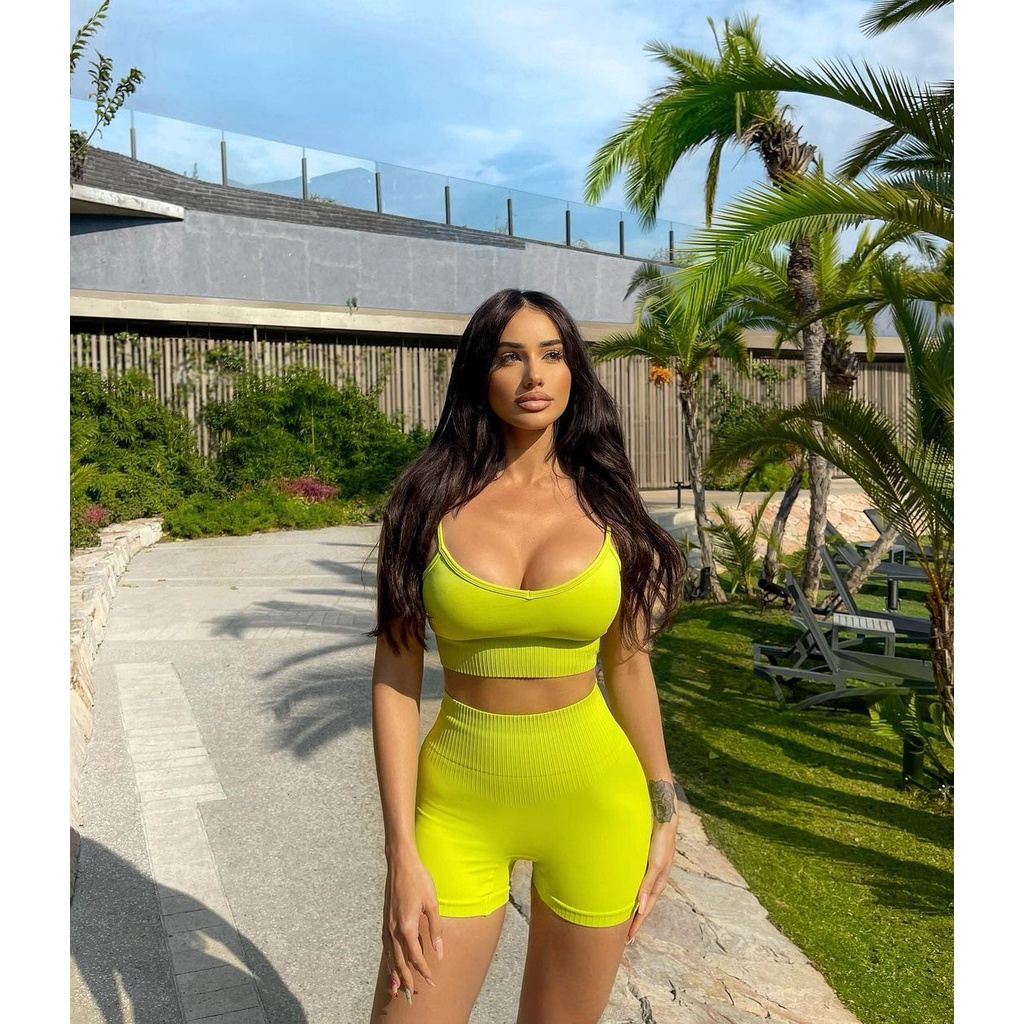 Bộ trang phục 2 món phong cách thể thao legging co giãn màu trơn không viền cho nữ