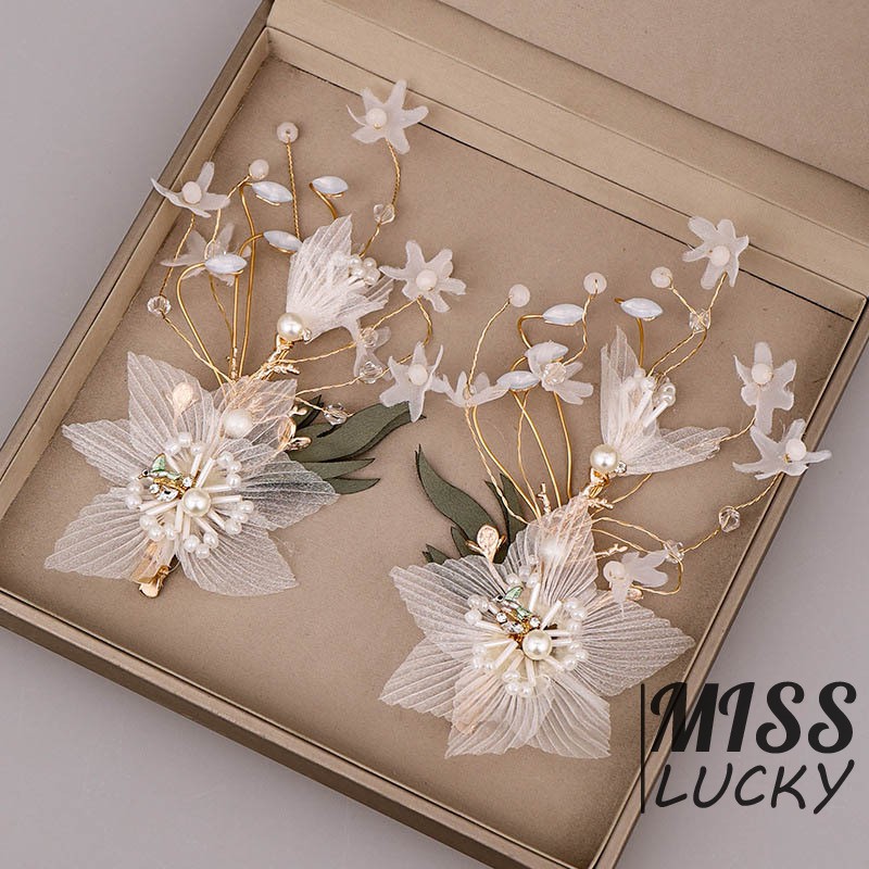 Khuyên tai và kẹp tóc cô dâu thời trang thanh tú