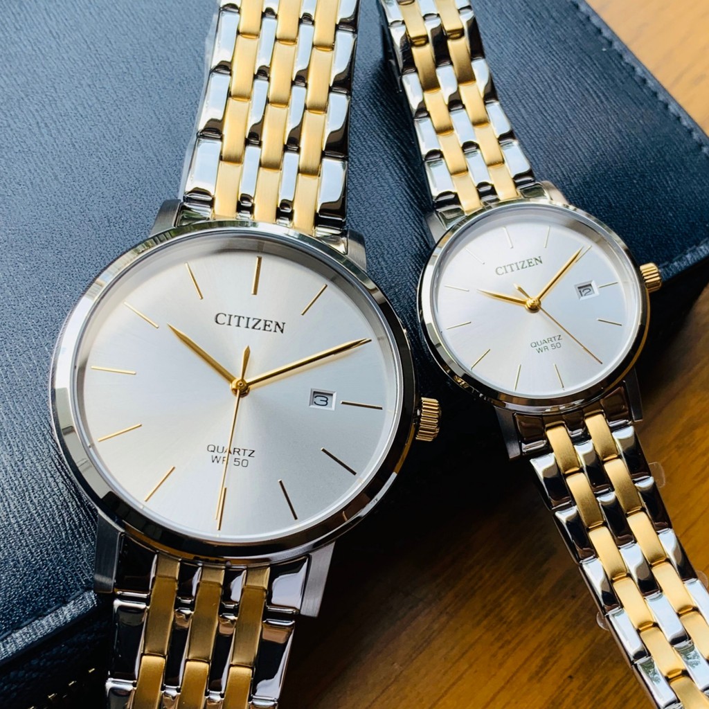 Đồng hồ đôi Nam/Nữ chính hãng Citizen BI5074-56A Mặt trắng,Lịch-Máy Pin Quartz-Dây kim loại cao cấp-Size Nam 39,Nữ 28mm