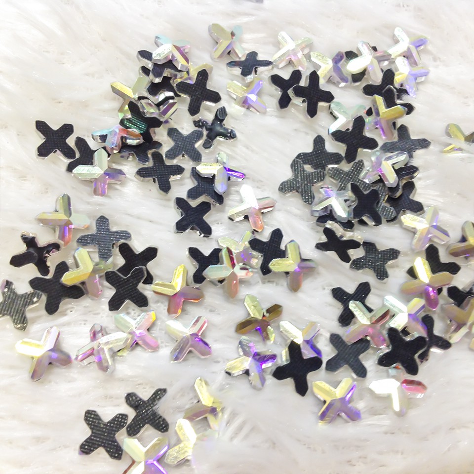 Đá ủi nhiệt hình ngôi sao 4 cánh, hạt đá ủi áo đầm ngôi sao ánh 7 màu hat hong kong siêu đẹp