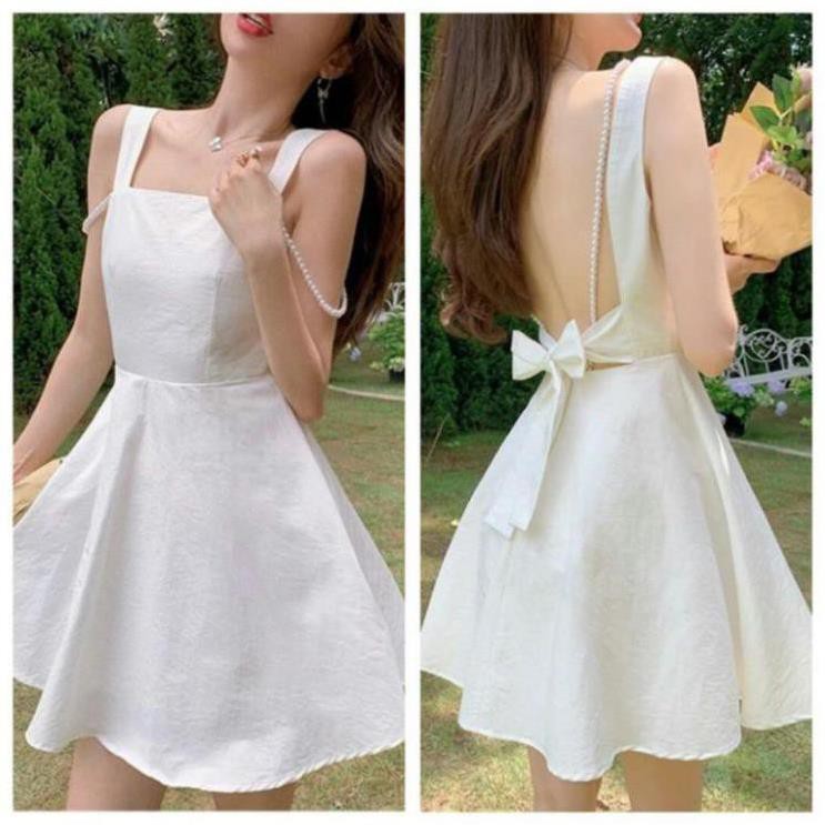 Đầm trắng hở lưng cột nơ dây chuỗi nhẹ nhàng xinh xắn | BigBuy360 - bigbuy360.vn