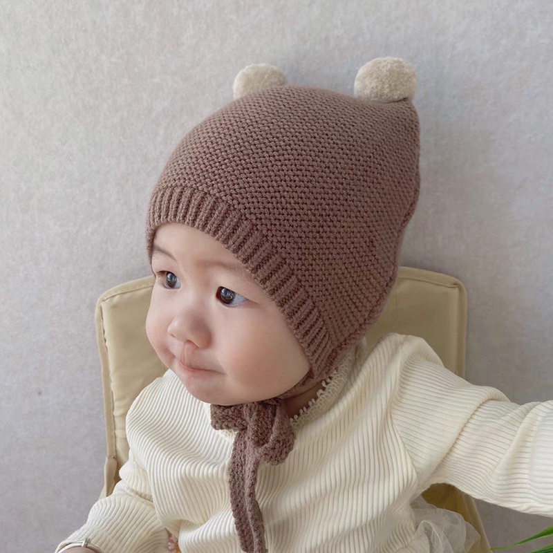 Mũ beanie dệt kim đính hai quả bông hoạt hình giữ ấm vào mùa đông đáng yêu cho bé