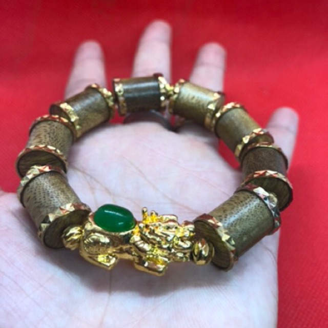 Vòng trầm indo mix tỳ hưu bọc viền vàng xi mạ 24k bảo hành 1 năm