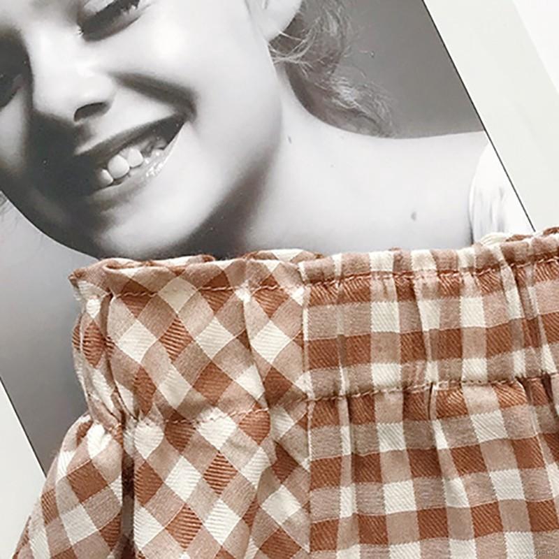 Bộ gồm áo hai dây phối bèo và chân váy họa tiết ca rô xinh xắn cho bé gái