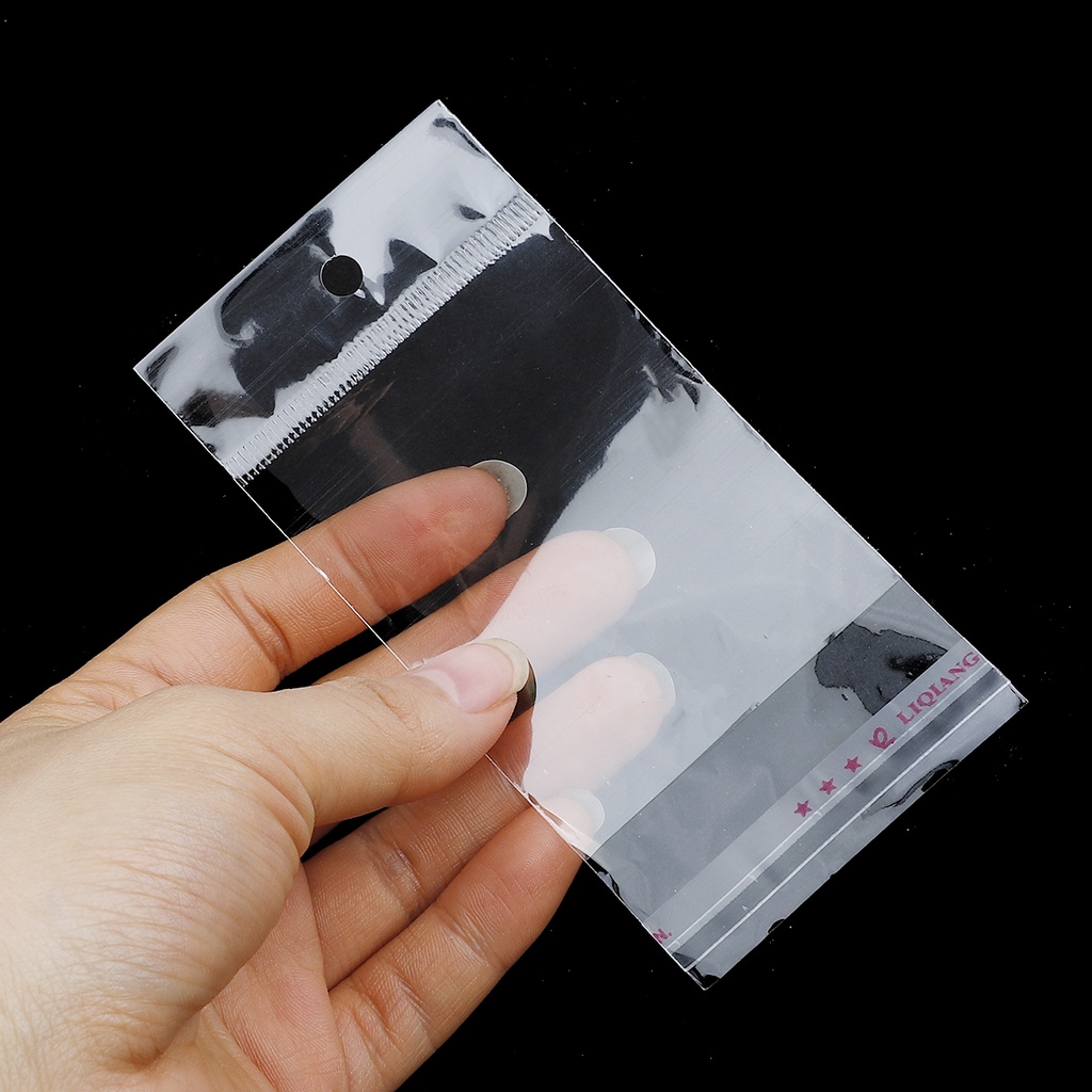 Set 100 túi nhựa OPP poly trong suốt có keo dán tự dính và lỗ treo dùng đóng gói bao bì bán lẻ