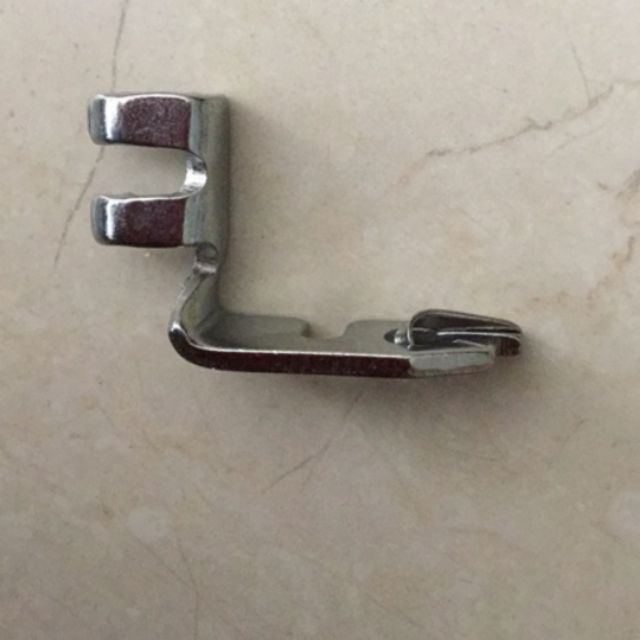 Chân vịt cuốn biên máy may con bướm