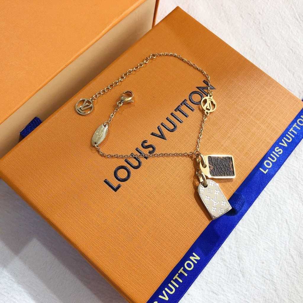 Vòng Tay Louis Vuitton Bằng Thép Titan Họa Tiết Chữ LV Sang Trọng Thời Trang