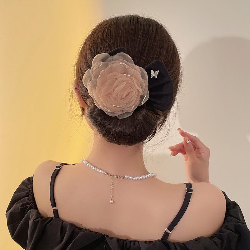 Kẹp Tóc Nơ Xoắn Ma Thuật Cho Nữ