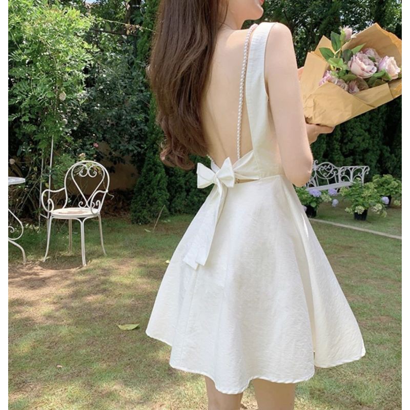 Đầm trắng hở lưng cột nơ dây chuỗi xinh xắn Ciara Dress