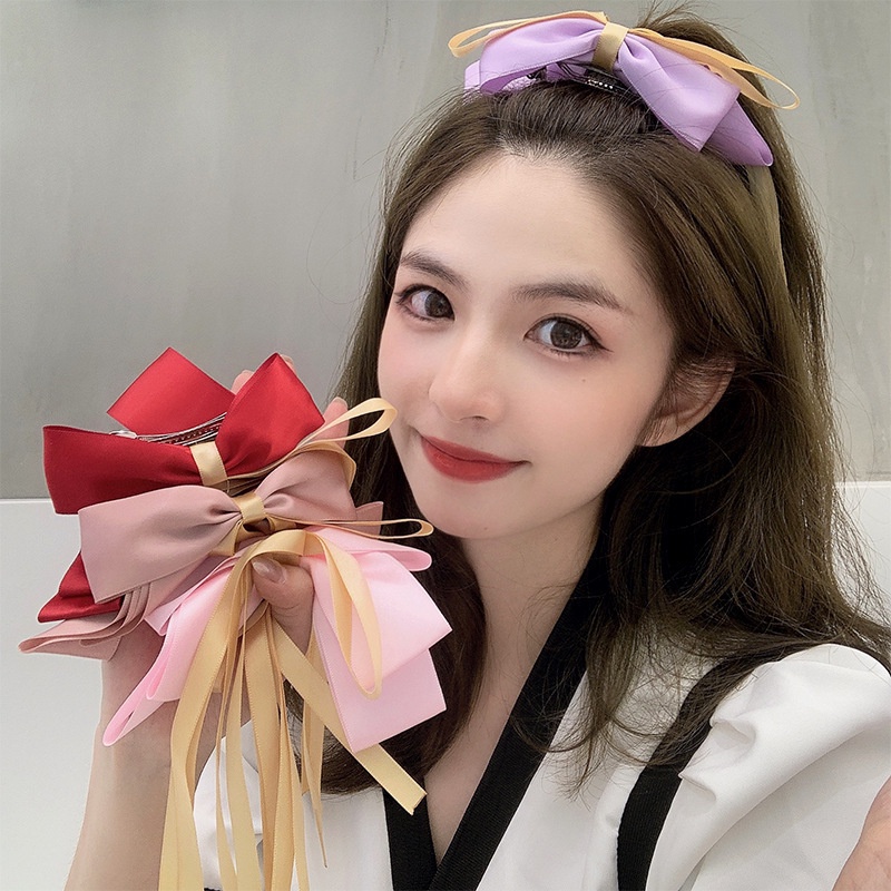 Kẹp tóc nơ nữ tính đơn giản và dễ thương