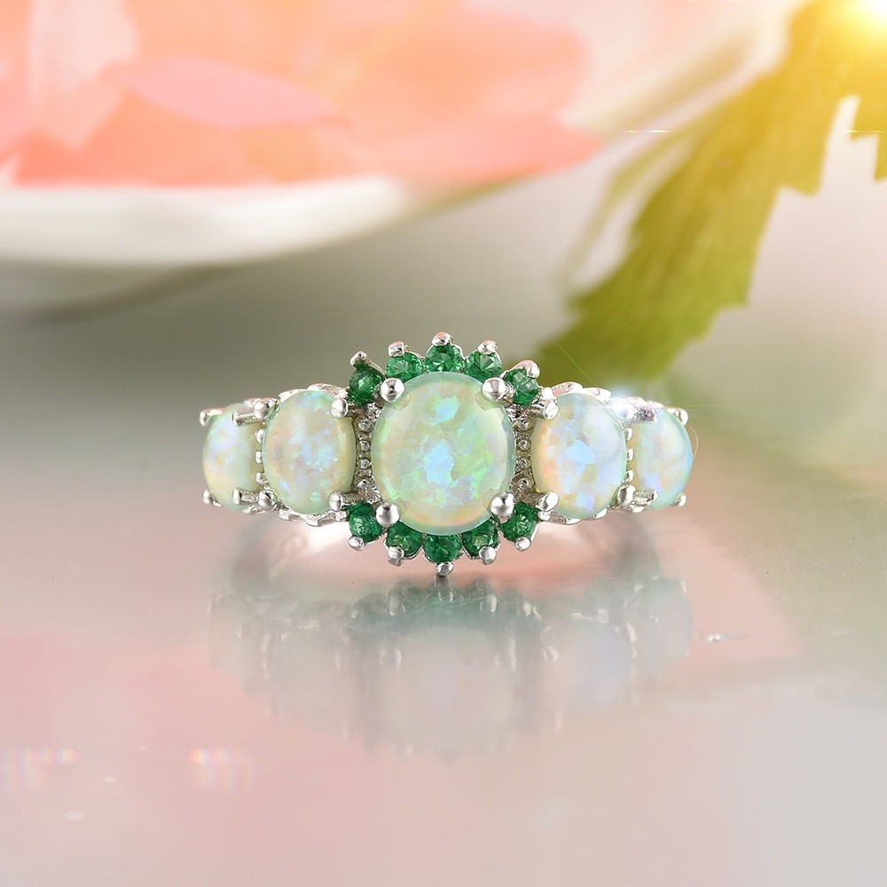 Nhẫn mặt gắn đá opal màu xanh thiết kế đơn giản sang trọng
