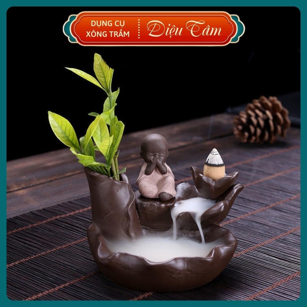 Tháp khói trầm hương hình chú tiểu, thác trầm hương đốt nụ trầm khói ngược thay cho lư đốt trầm Diệu Tâm