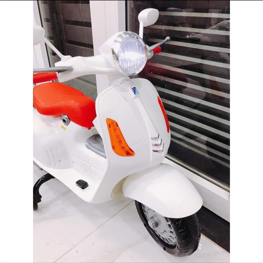 xe máy điện trẻ em vecpa - xe máy điện vespa cho bé sành điệu 1-8 tuổi.