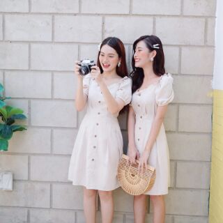 Đầm caro nút gỗ tay phồng