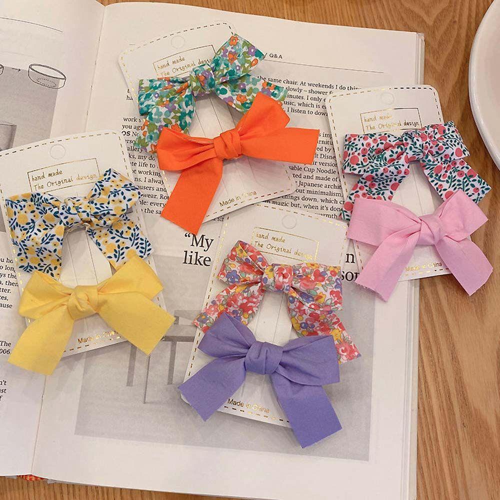 IVORY Set 2 Kẹp Tóc Hình Nơ Họa Tiết Hoa Màu Sắc Trơn Dành Cho Bé Gái