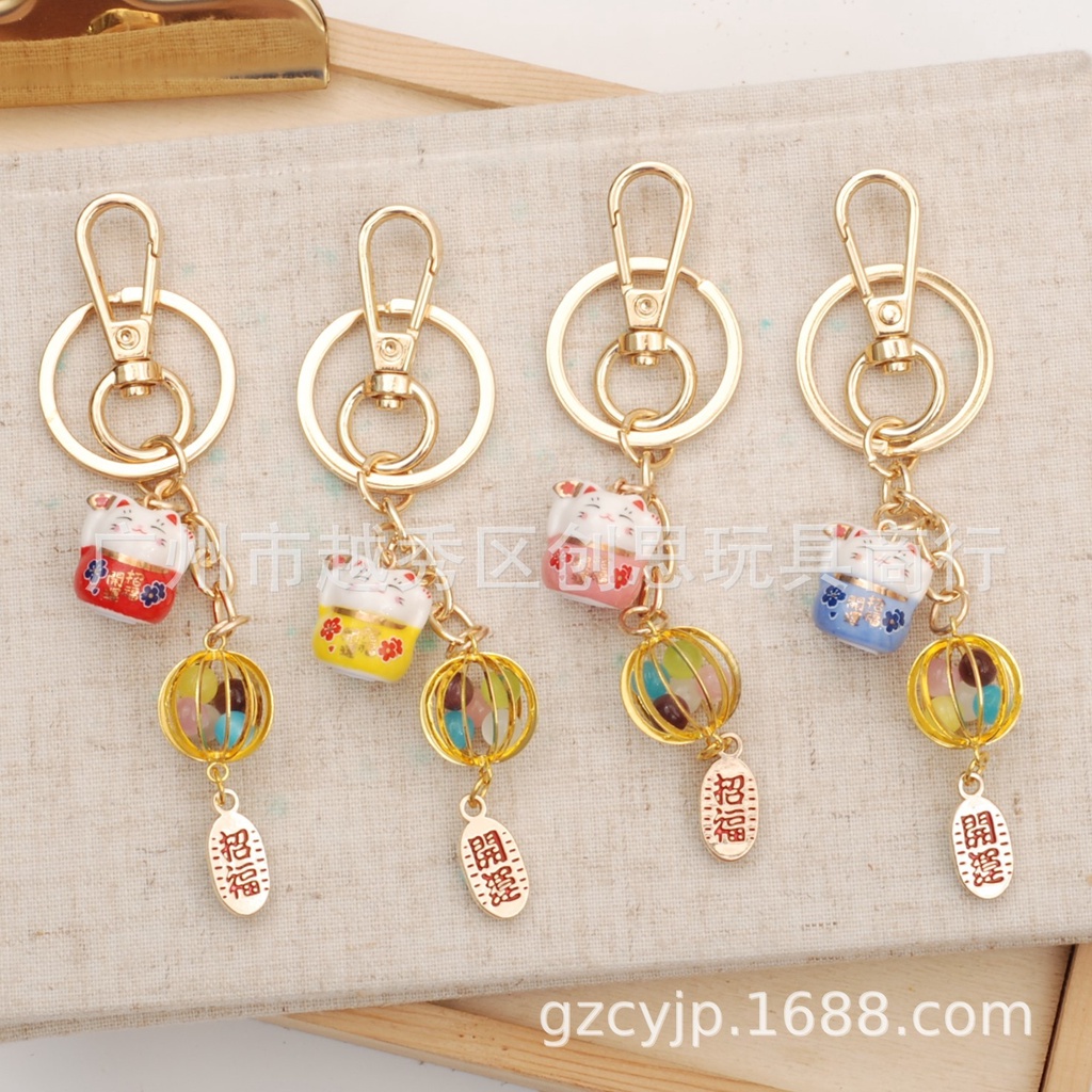 Móc khoá Mèo Thần tài sứ Lồng Chim - MK46