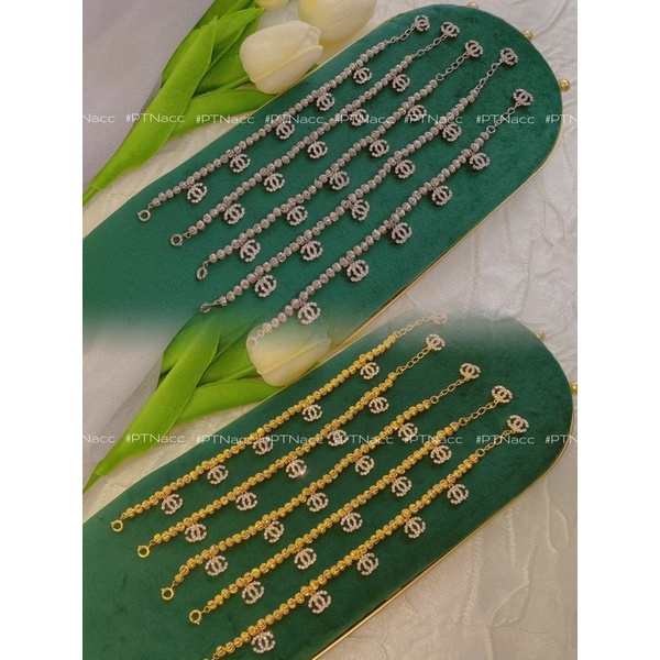 Lắc tay bi xi 2 màu trắng, vàng charm logo X, lắc bi charm thương hiệu sang trọng .PTNACC.