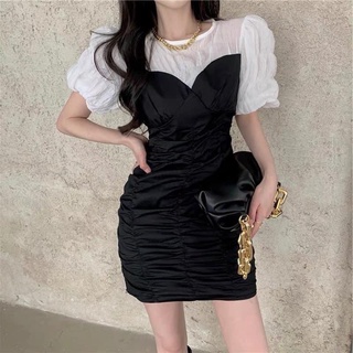 Váy trắng nhúm thân tay