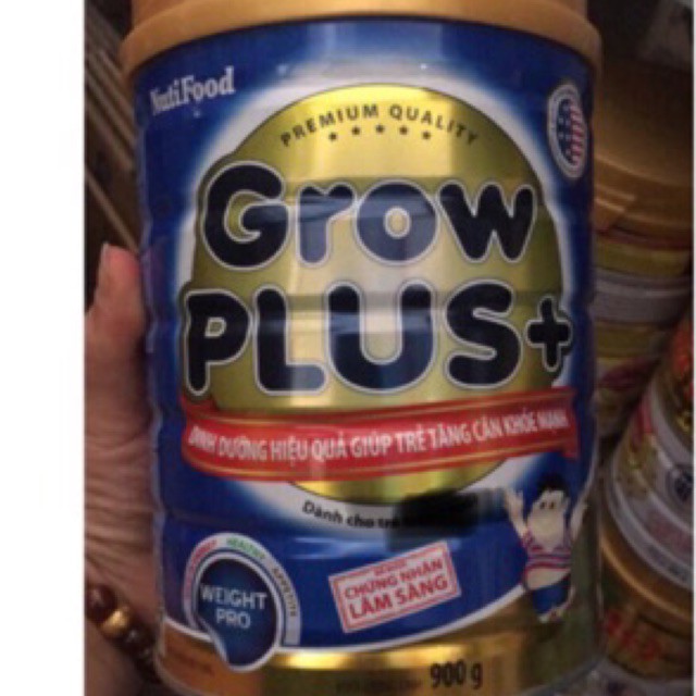 Mẫu mới -Sữa bột grow plus xanh lon loại 900g.