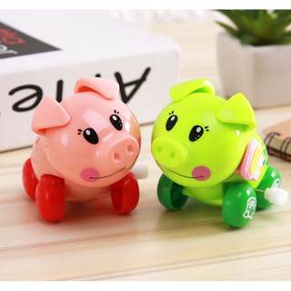 Đồ chơi heo lên dây cót cho bé