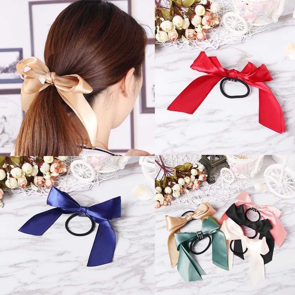 Dây Cột Tóc Co Giãn Đính Nơ Xinh Xắn Cho Nữ