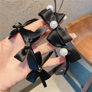 cài nơ xinh xắn màu đen