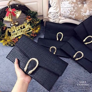 Ví clutch đầu rồng