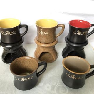 Cốc và bếp hâm nóng cafe