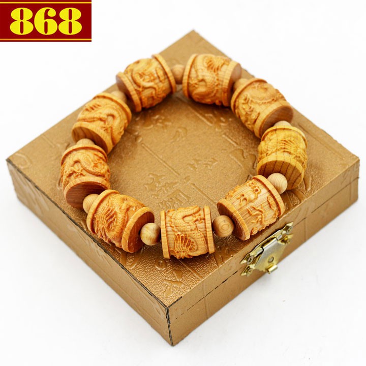 Vòng tay trụ rồng gỗ ngọc am